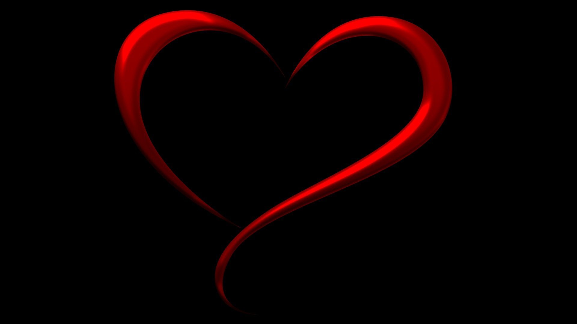 Красное сердце на черном фоне