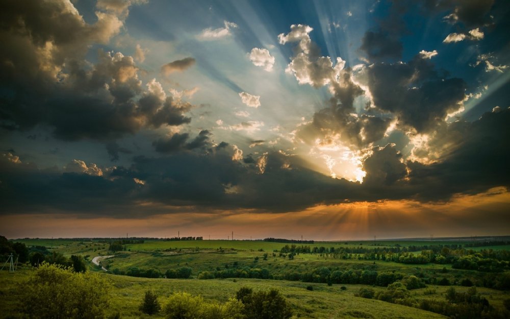 Небо солнце сквозь тучи