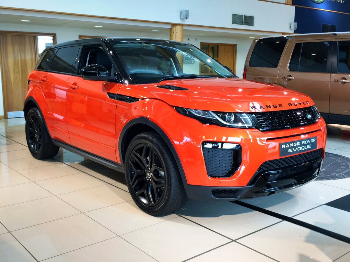 Рендж ровер эвок. Land Rover range Rover Evoque 2015. Рендж Ровер Эвок оранжевый. Land Rover range Rover Evoque 2. Ленд Ровер Evoque 2015.